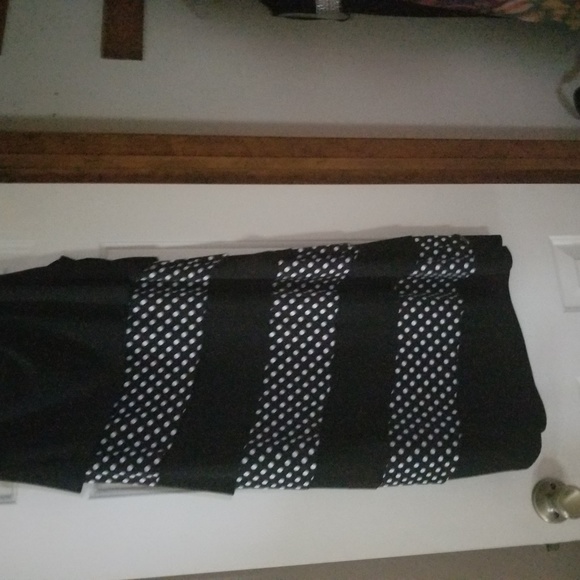 A polka dotted ruffled dress  and pants - Picture 1 of 5